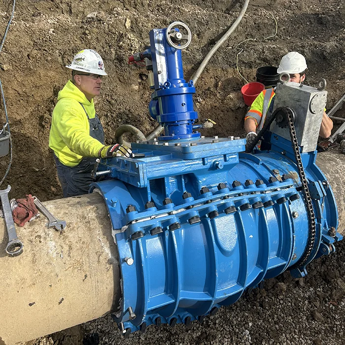 Valve insertions allow for work on live lines